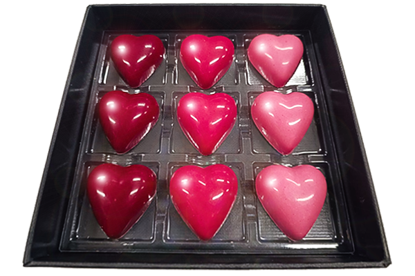 miele e cioccolatini a forma di cuore san valentino